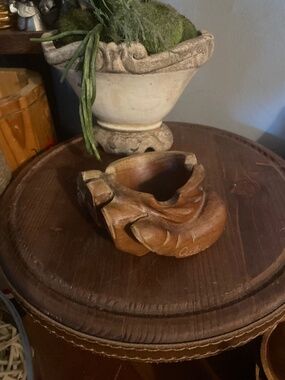 Wooden hand cigar ashtray